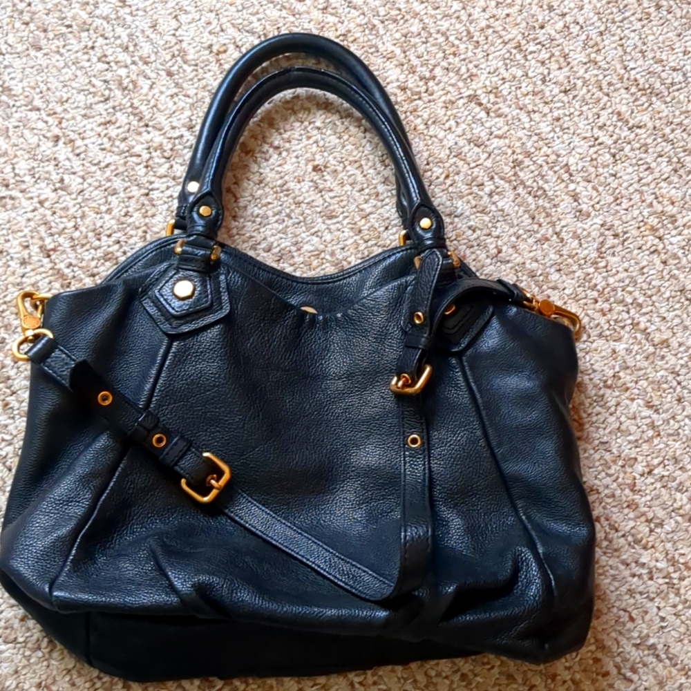 Beautiful soft leather bag with gold hardware.